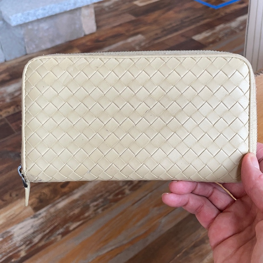 Bottega Veneta cream colored zip around wallet